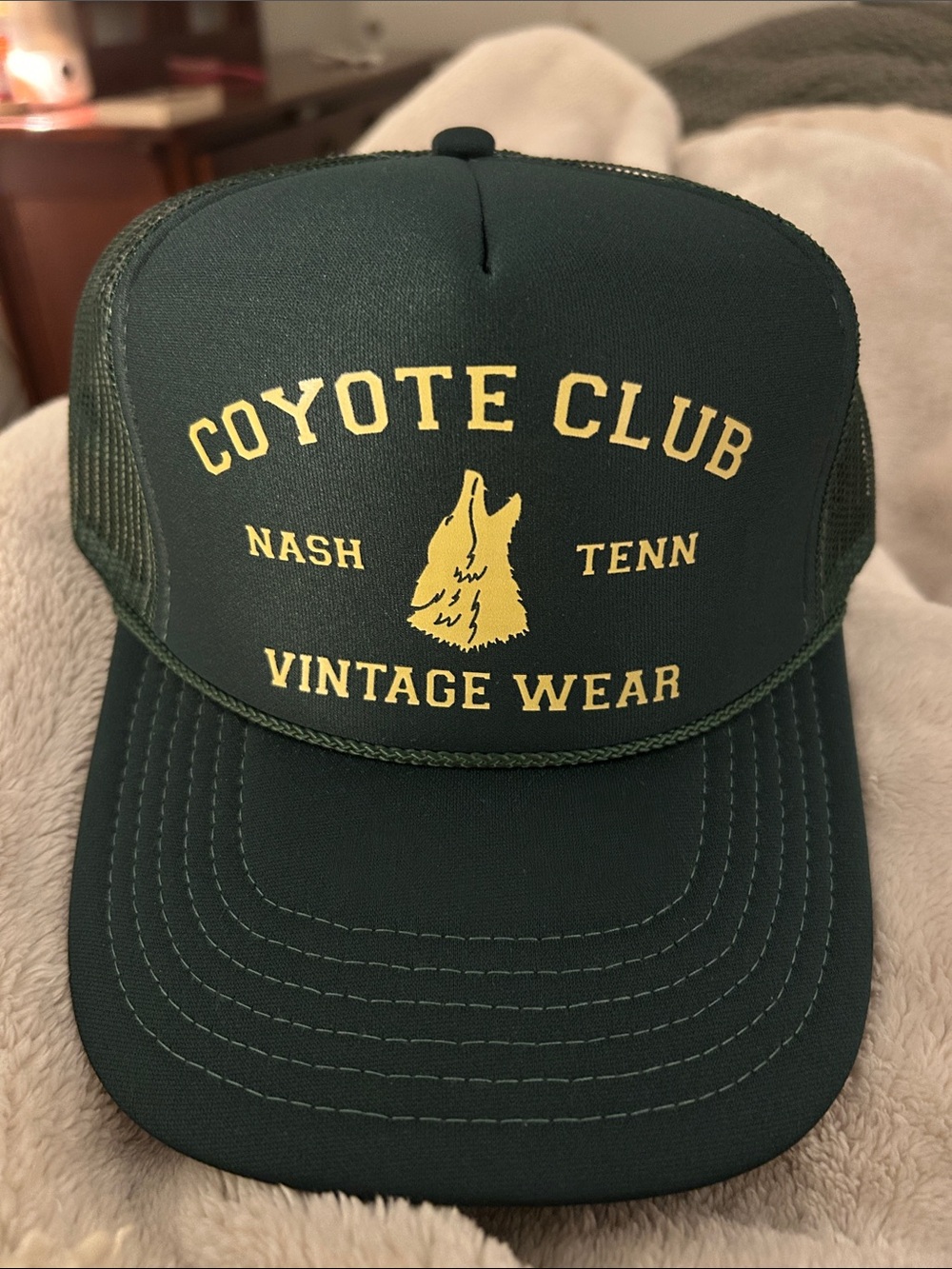Trucker Hat in Dark Green with Yellow Logo